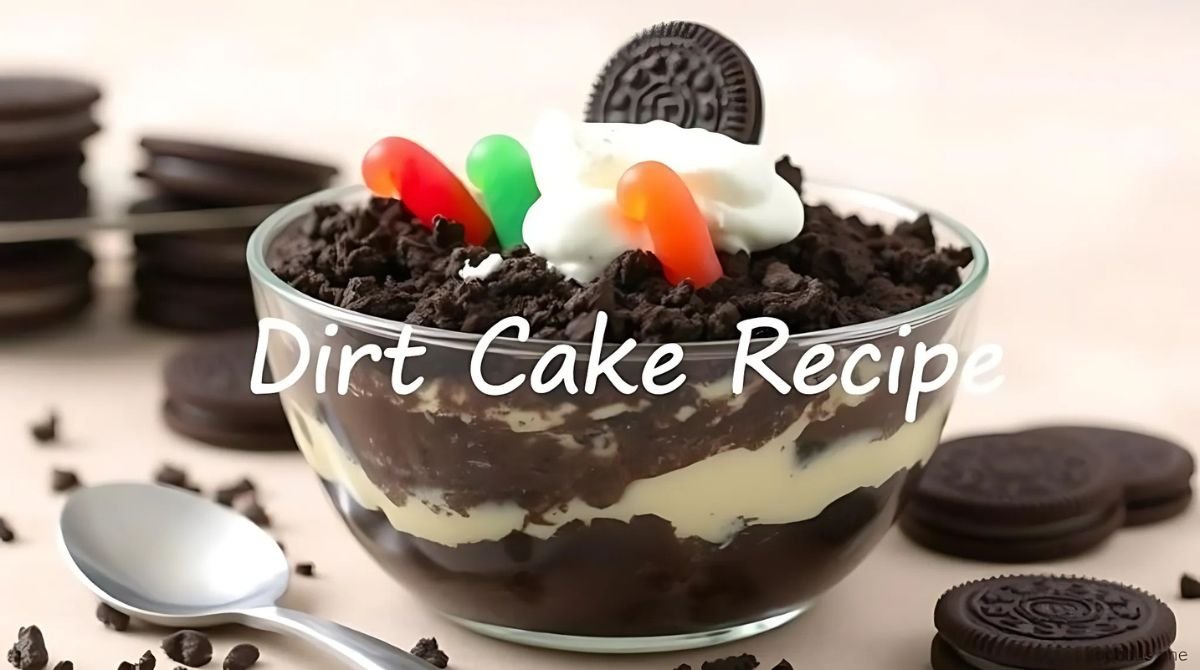 "An image capturing the process of layering crushed Oreos and creamy pudding mixture in a glass trifle dish. A spoon or spatula should be visible spreading the layers evenly. The contrast between the dark cookie crumbs and the light pudding filling should be clearly shown, emphasizing the layers."